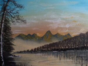 Teton mountains with misty Snake River bend.